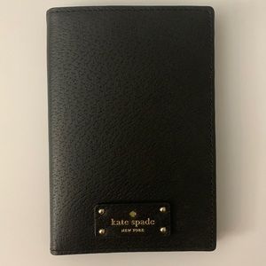 Kate Spade passport holder. Color: black. Used twice. Good condition.